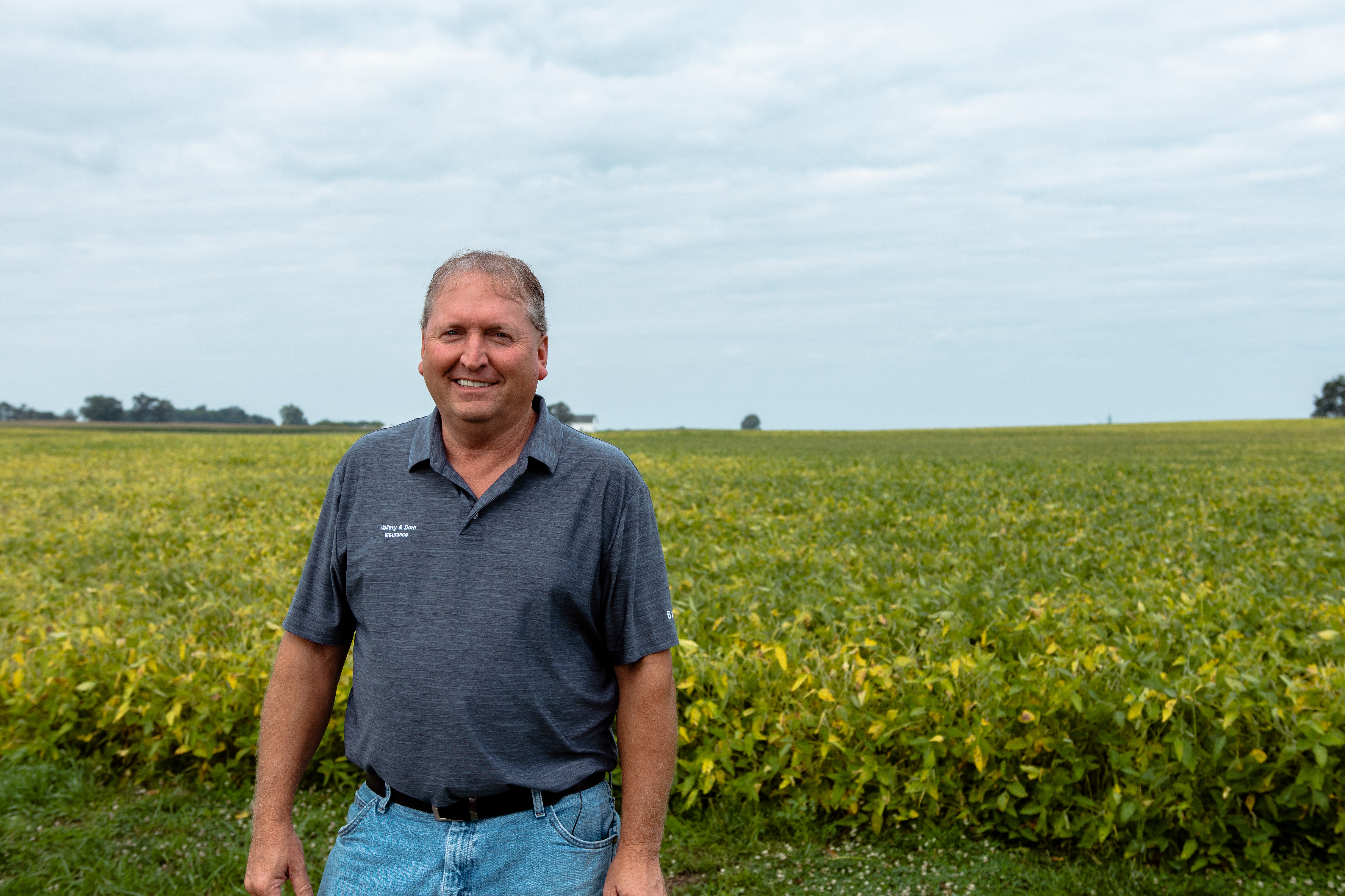 Enlist farmer in soybean field